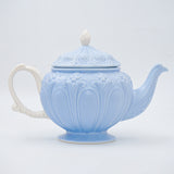 Decorative vintage porcelain blue tea pot with 4 cups & saucers
